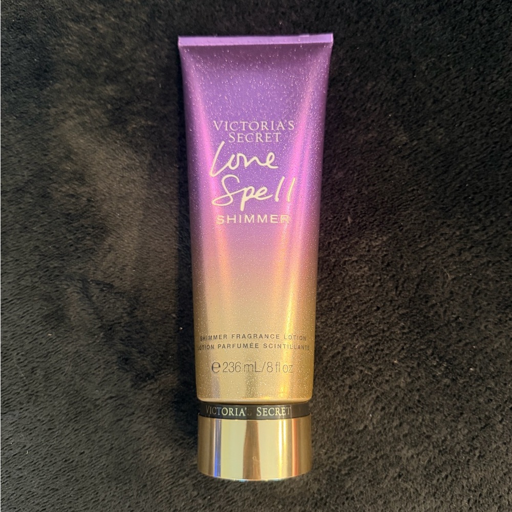 Victoria's Secret Love Spell Shimmer Lotion in Purple and Gold